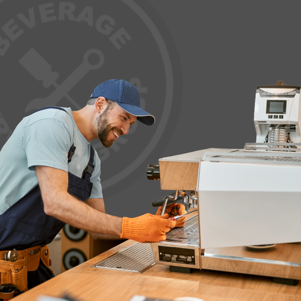 man fixing coffee equipment